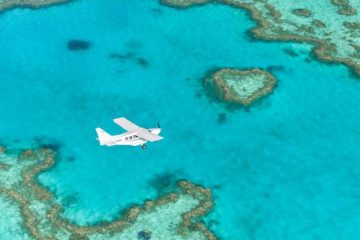 whitsundays islands scenic flight heart reef airlie beach whitehaven beach backpacker combo
