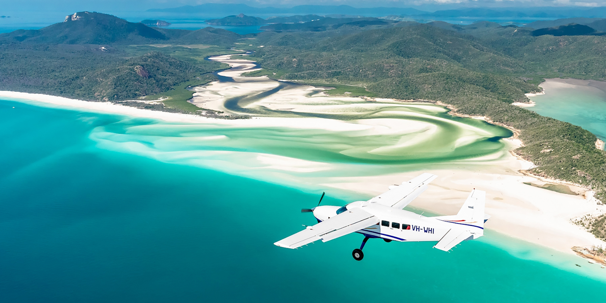 whitsunday islands scenic flight whitehaven beach backpacker australia